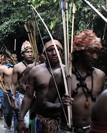 Indigenous South American Indians with bow and arrows. 