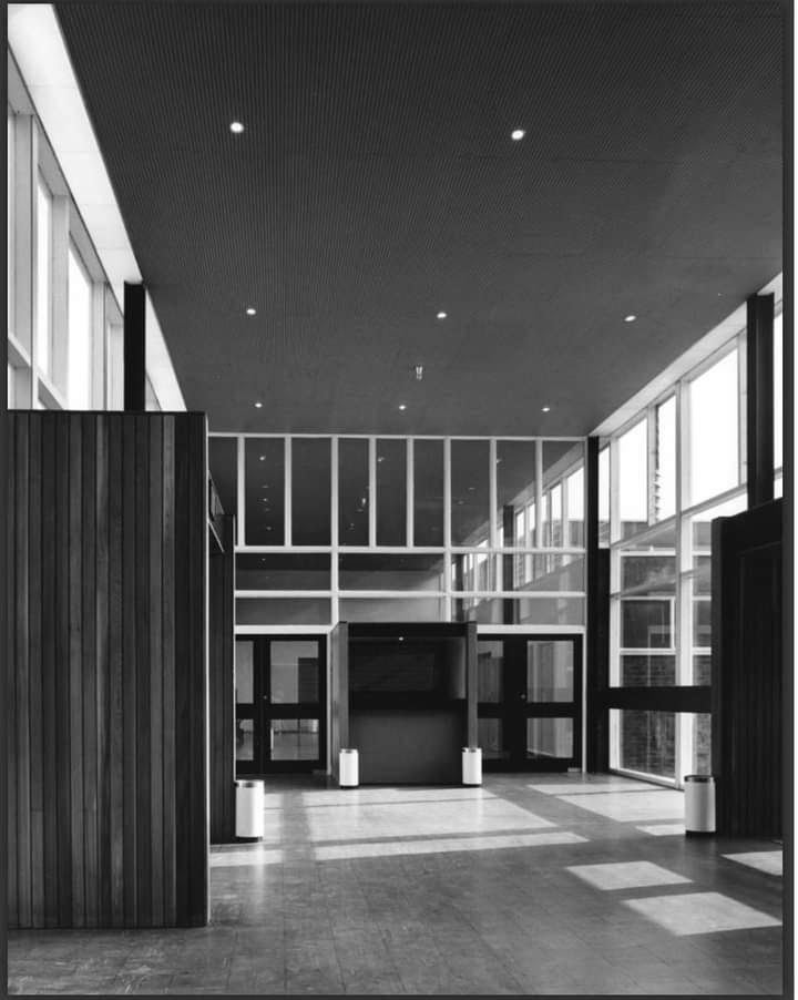 Black and white image of the Denny Civic Theatre - looks like the entrance area, viewed from inside.